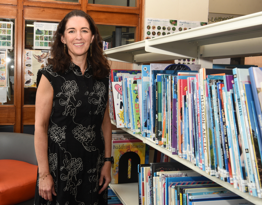 Amanda Branigan, County Librarian and Head of Cultural Services with Louth County Council photographed beside a book shelf in Ardee Library