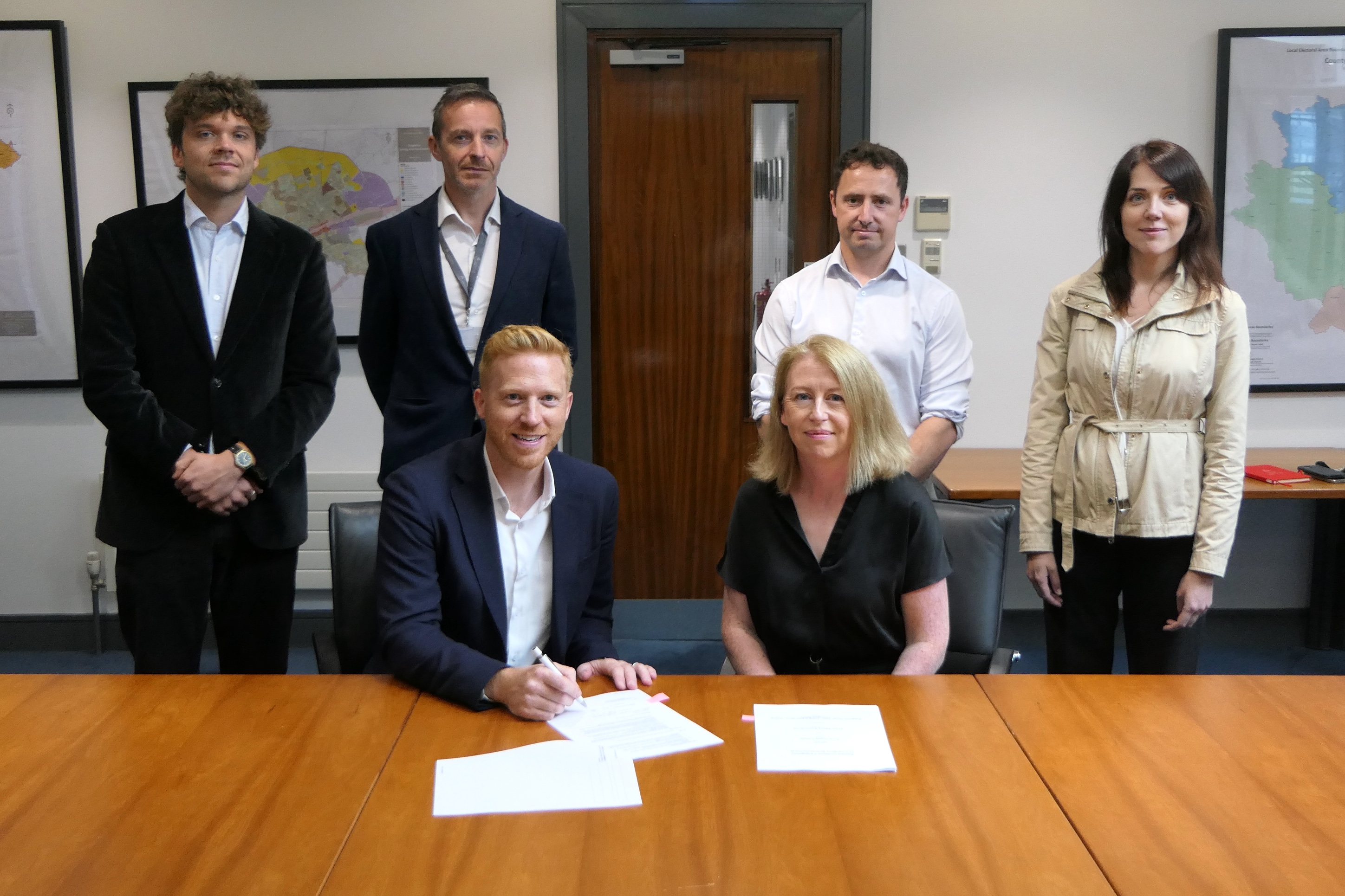 L-R: Rory John McGuire, Urban Agency, Enda O’Halloran, Louth County Council; Christopher Kelly, Louth County Council; Alina Surduleasa, Urban Agency, Andrew Griffin, Director, Urban Agency and Olivia McCormack, SEO, Louth County Council, at the Living in Carlingford contract signing at County Hall Contract-Signing-Carlingford-Urban-Life